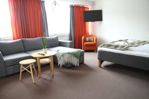 Family Quadruple Room, 1 Bedroom | Individually furnished, blackout drapes, free WiFi, bed sheets