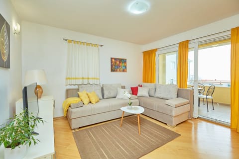 City Apartment, 1 Bedroom, Balcony | Living area | LCD TV