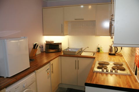 Family Apartment (First floor 4) | Private kitchen | Full-size fridge, microwave, oven, stovetop