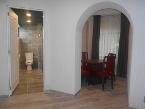 Family Suite, 2 Double Beds | Living area | 31-inch flat-screen TV with cable channels, TV, DVD player