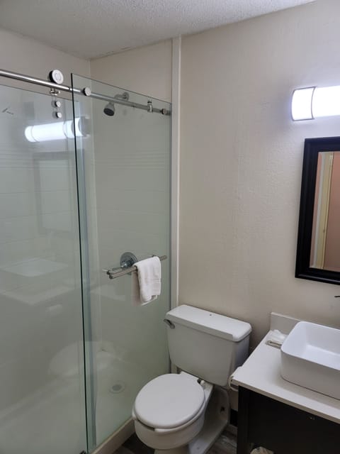 Room, 2 Queen Beds | Bathroom | Shower, free toiletries, towels