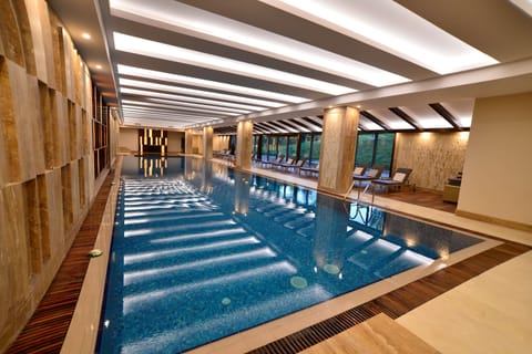 Indoor pool, open 6:00 AM to 10:00 PM, sun loungers
