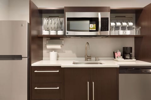 Suite, 1 Bedroom | Private kitchen | Full-size fridge, microwave, dishwasher, coffee/tea maker