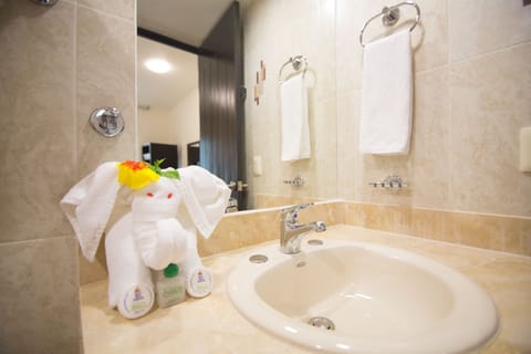 Standard Room, 1 King Bed, Balcony | Bathroom | Shower, free toiletries, hair dryer, towels