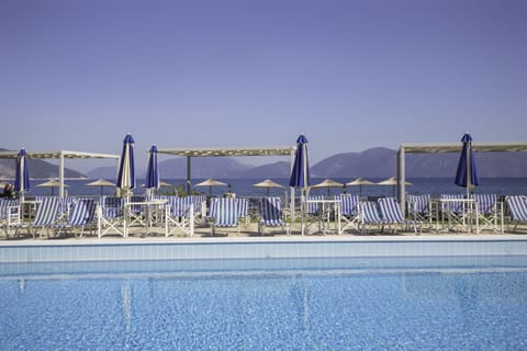 Outdoor pool, pool umbrellas, sun loungers