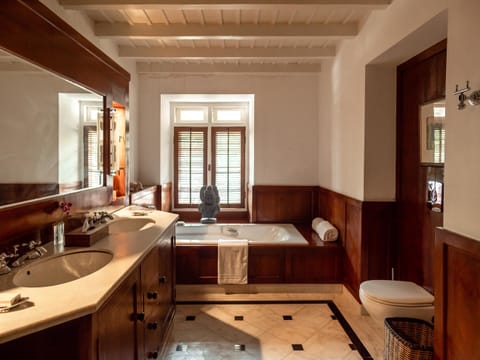 Luxury Junior Suite | Bathroom | Designer toiletries, hair dryer, bathrobes, towels