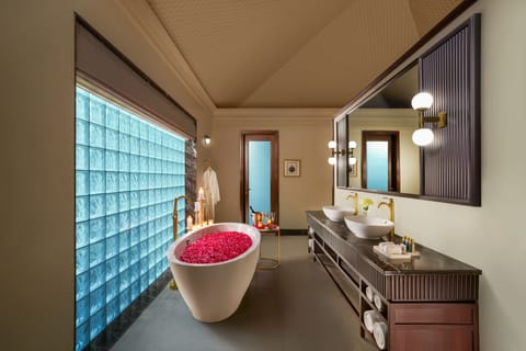 Luxury Suite, River View (Tent) | Bathroom | Shower, free toiletries, hair dryer, slippers