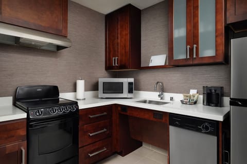 Suite, 1 Bedroom, Non Smoking | Private kitchen | Full-size fridge, microwave, stovetop, dishwasher