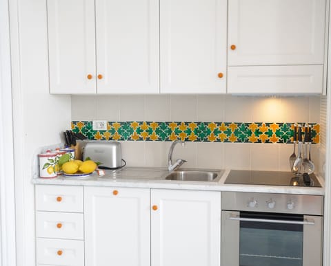 Deluxe Studio, Balcony, Sea View (Jacuzzi) | Private kitchenette | Fridge, microwave, stovetop, dishwasher