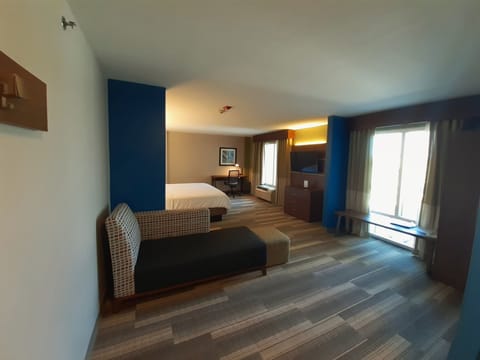 Suite, 1 King Bed | In-room safe, desk, iron/ironing board, free cribs/infant beds