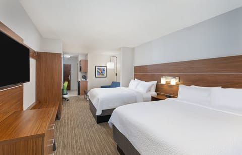 Suite, 2 Queen Beds | In-room safe, desk, iron/ironing board, free cribs/infant beds
