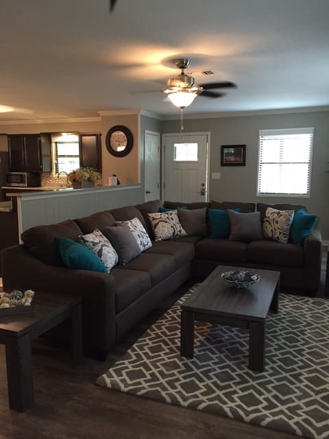 Unit A - Condo, 3 Bedrooms, 2 Bath, 1 King, 2 Queens and 1 Sofa Bed - River View | Living area | Flat-screen TV