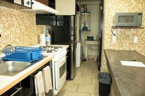 Comfort Apartment | Private kitchen | Fridge, microwave, oven, stovetop