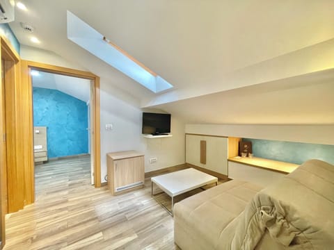 Family Suite | Living area | Flat-screen TV