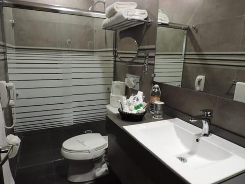 Shower, free toiletries, hair dryer, towels