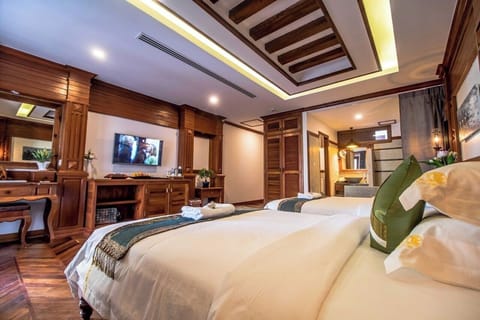 Deluxe Twin Room, Balcony, Pool View | Minibar, in-room safe, desk, laptop workspace