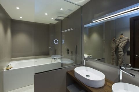 Suite, 1 King Bed, Non Smoking (Separate Living Room) | Bathroom | Designer toiletries, hair dryer, towels