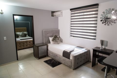 Junior Suite, 1 Queen Bed | In-room safe, desk, iron/ironing board, free WiFi