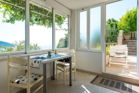 Standard Apartment, 1 Bedroom, Terrace, Sea View | In-room dining