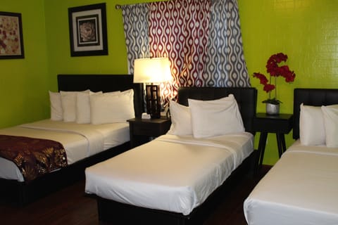 Family Room, Multiple Beds | Desk, free WiFi, bed sheets