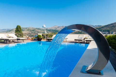 Outdoor pool, sun loungers