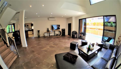 Luxury Villa, 5 Bedrooms, Pool Access, Beach View | Living area | 60-inch flat-screen TV with cable channels, TV, fireplace