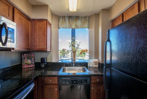 Oceanfront Deluxe One Bedroom Queen Condo | Private kitchen | Coffee/tea maker