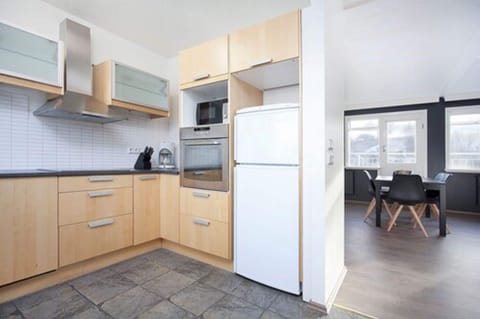 City Apartment, 3 Bedrooms | Private kitchen | Fridge, microwave, stovetop, dishwasher