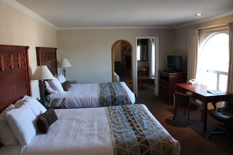 Deluxe, 3 Queen Beds, Fireplace | In-room safe, desk, iron/ironing board, free WiFi