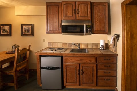 Signature Suite, 2 Bedrooms | Private kitchenette | Fridge, microwave, stovetop, coffee/tea maker