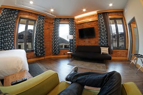 Junior Suite, 1 King Bed | Living area | Flat-screen TV
