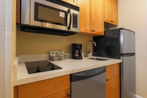 Studio, 1 Queen Bed, Non Smoking | Private kitchen | Full-size fridge, microwave, stovetop, dishwasher