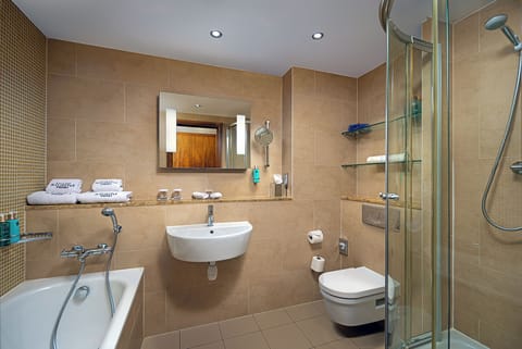 Separate tub and shower, free toiletries, hair dryer, bathrobes