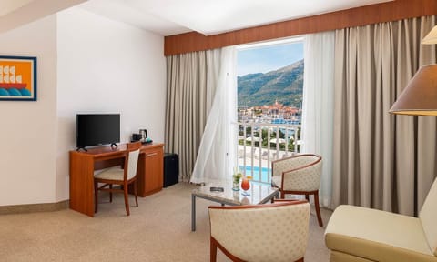 Superior junior suite, seaside | Minibar, in-room safe, desk, soundproofing