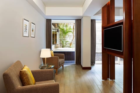 Suite, 1 Bedroom | Living room | LED TV