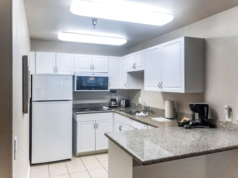 Standard Room, 2 Bedrooms, No View | Private kitchen | Full-size fridge, microwave, stovetop, dishwasher