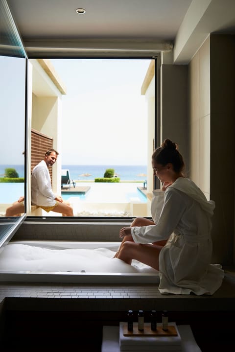 Grand Suite, Sea View (Beachfront Swim Up) | Bathroom | Shower, rainfall showerhead, designer toiletries, hair dryer