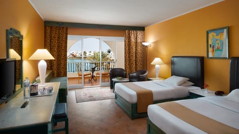 Standard Room, Lagoon View | Free minibar, in-room safe, WiFi, bed sheets