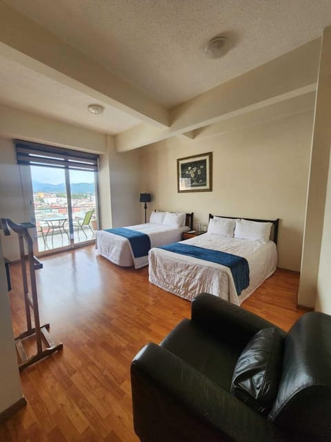 Family Suite, 2 Bedrooms, Accessible, Corner | Individually decorated, individually furnished, desk, blackout drapes