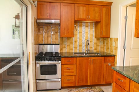 Suite, 1 Bedroom, Garden View | Private kitchen | Fridge, microwave, stovetop, coffee/tea maker