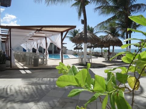 4 outdoor pools, open 9:00 AM to 9:30 PM, pool umbrellas, sun loungers