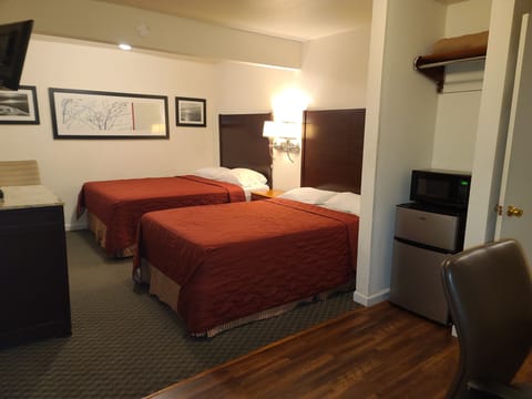 Premium Room, Multiple Beds | Desk, blackout drapes, free WiFi, bed sheets