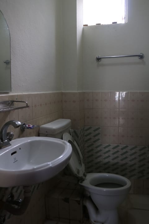 Standard Double or Twin Room, 2 Bedrooms, Smoking, City View (Deluxe Double Room with Private Bathr) | Bathroom | Free toiletries, hair dryer, slippers, towels