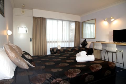 Queen Deluxe and Single | Premium bedding, desk, laptop workspace, free WiFi