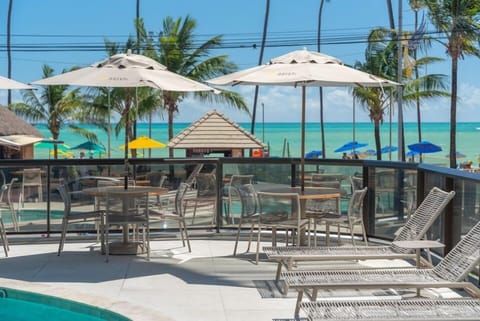 Outdoor pool, free cabanas, pool umbrellas