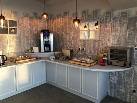 Daily buffet breakfast (EUR 15 per person)