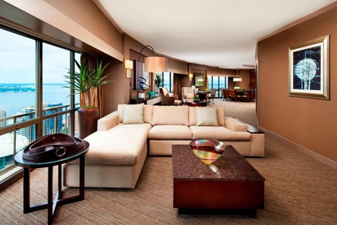 Luxury Suite, 1 King Bed | Living room | 55-inch flat-screen TV with digital channels, TV, pay movies