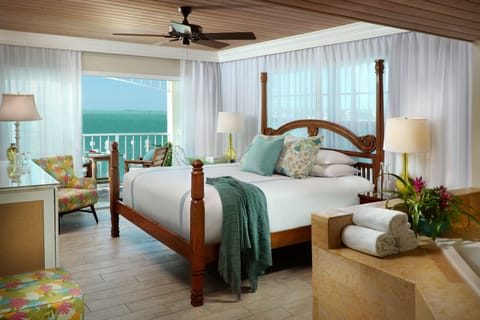 Deluxe Room, Oceanfront | Minibar, in-room safe, individually decorated, individually furnished