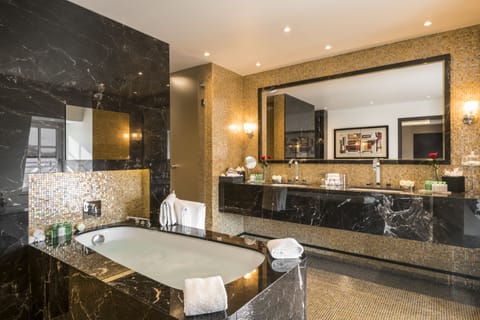 Presidential Room, 1 King Bed, Kitchenette, City View | Bathroom | Combined shower/tub, designer toiletries, hair dryer, towels