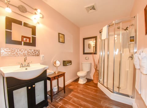 Suite, 1 King Bed, Jetted Tub (Fireplace) | Bathroom | Free toiletries, hair dryer, towels, soap